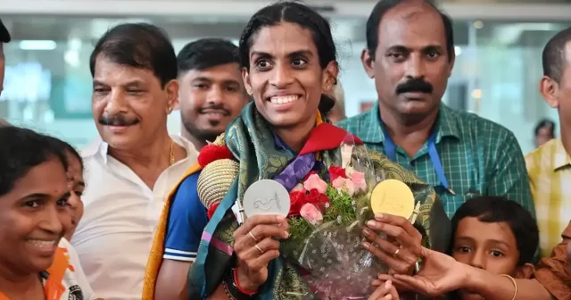 Sprinter M.R. Poovamma receiving a welcome in Mangaluru after the 2026 Asian Games