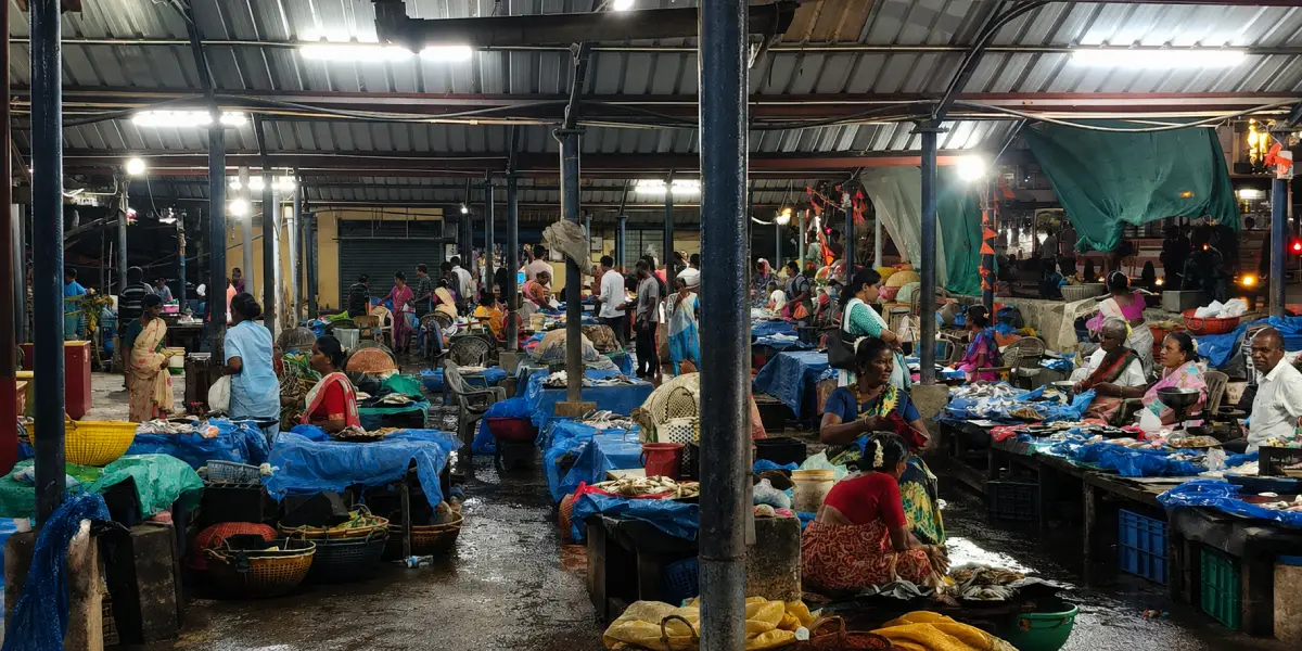 Fisherwomen selling fish at a Mangaluru market stall